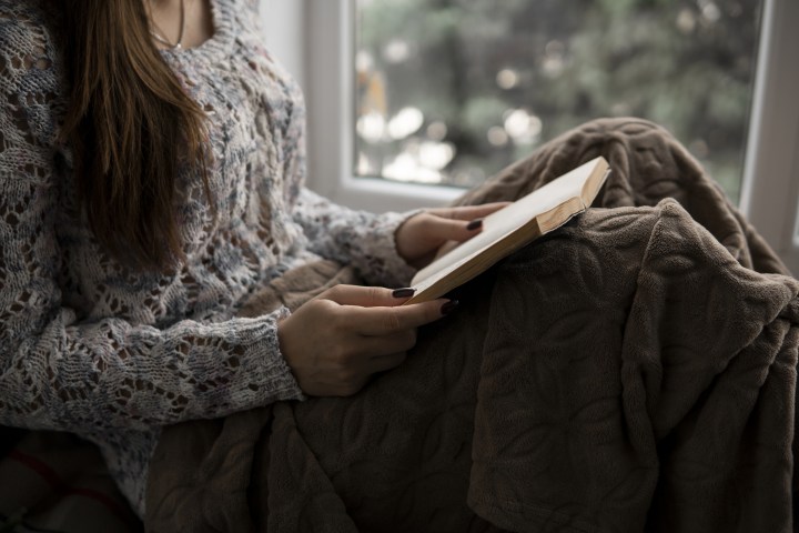 reading at window